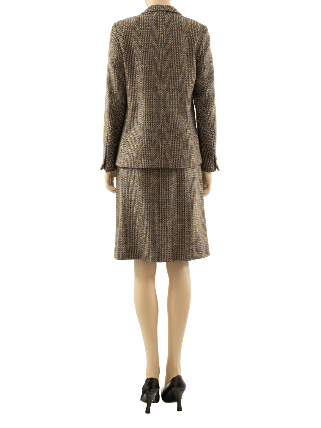 Back view of model wearing a 1970s Italian Forall Alpaca skirt suit. 