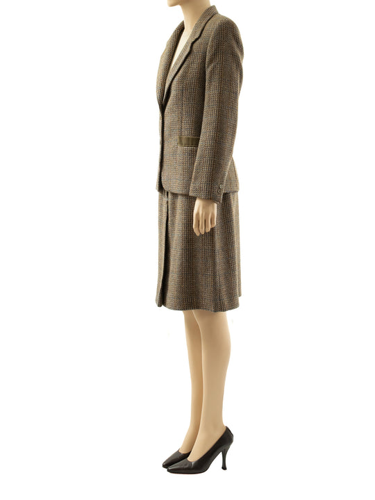 Side view of model wearing a vintage 70s Italian Forall Alpaca skirt suit in beige olive plaid. Italy 42. 