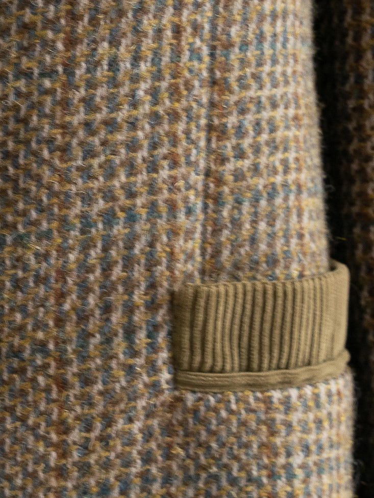 Front view of vintage Italian Forall suit jacket pocket with olive corduroy border. 1970s.